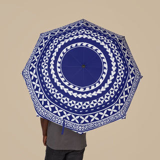 PasifikaOne umbrella in United Blue, 48-inch/122cm size, open showing vibrant blue canopy and sturdy handle.