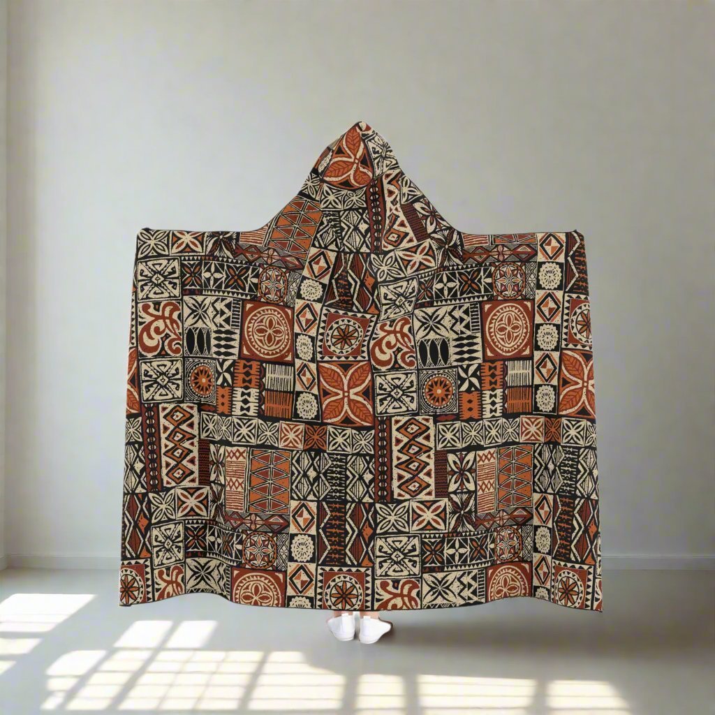 Elei hooded blanket featuring soft fabric, cozy hood, and vibrant design, perfect for warm comfort and relaxation.