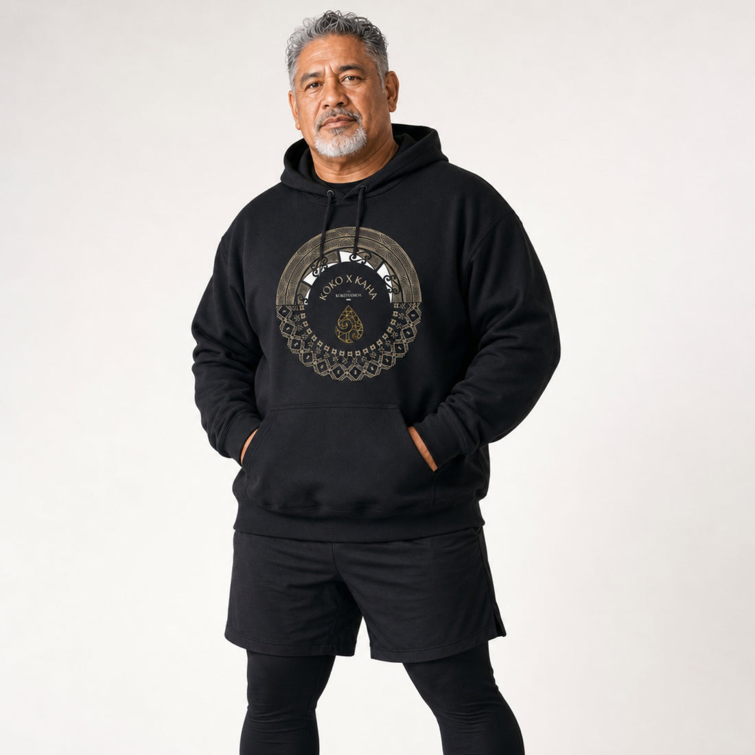 Model wearing Hoodie Aotearoa Samoa hoodie, featuring vibrant island-inspired design and comfortable fit.