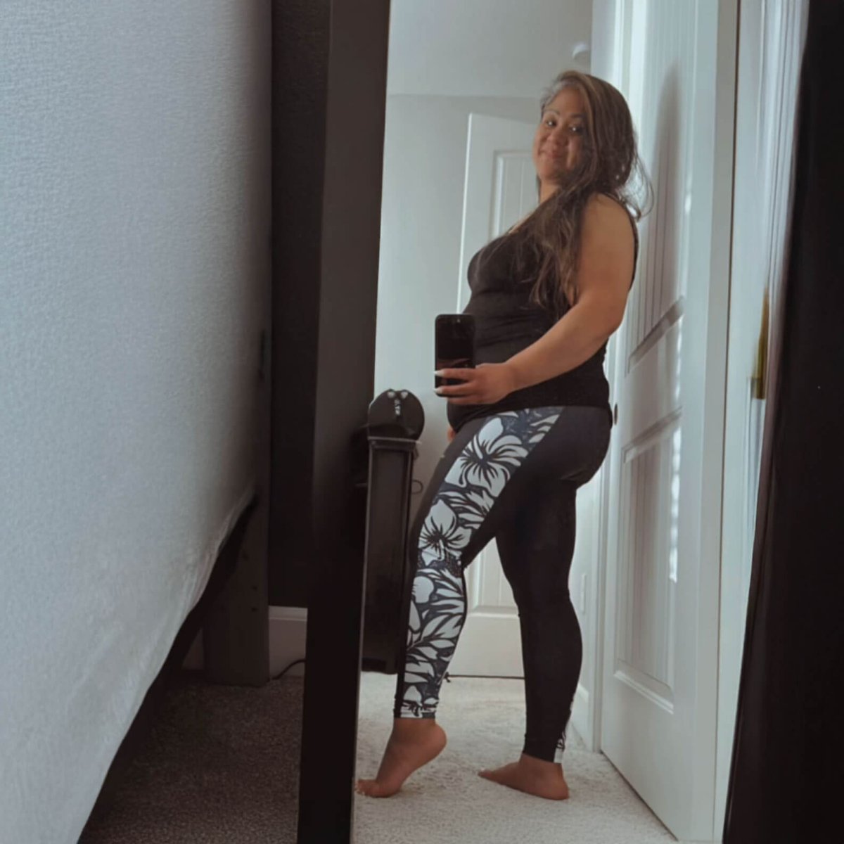 Black FYBY IslandFlex mid-rise leggings in size XS with a smooth, stretchy fabric and subtle branding details.