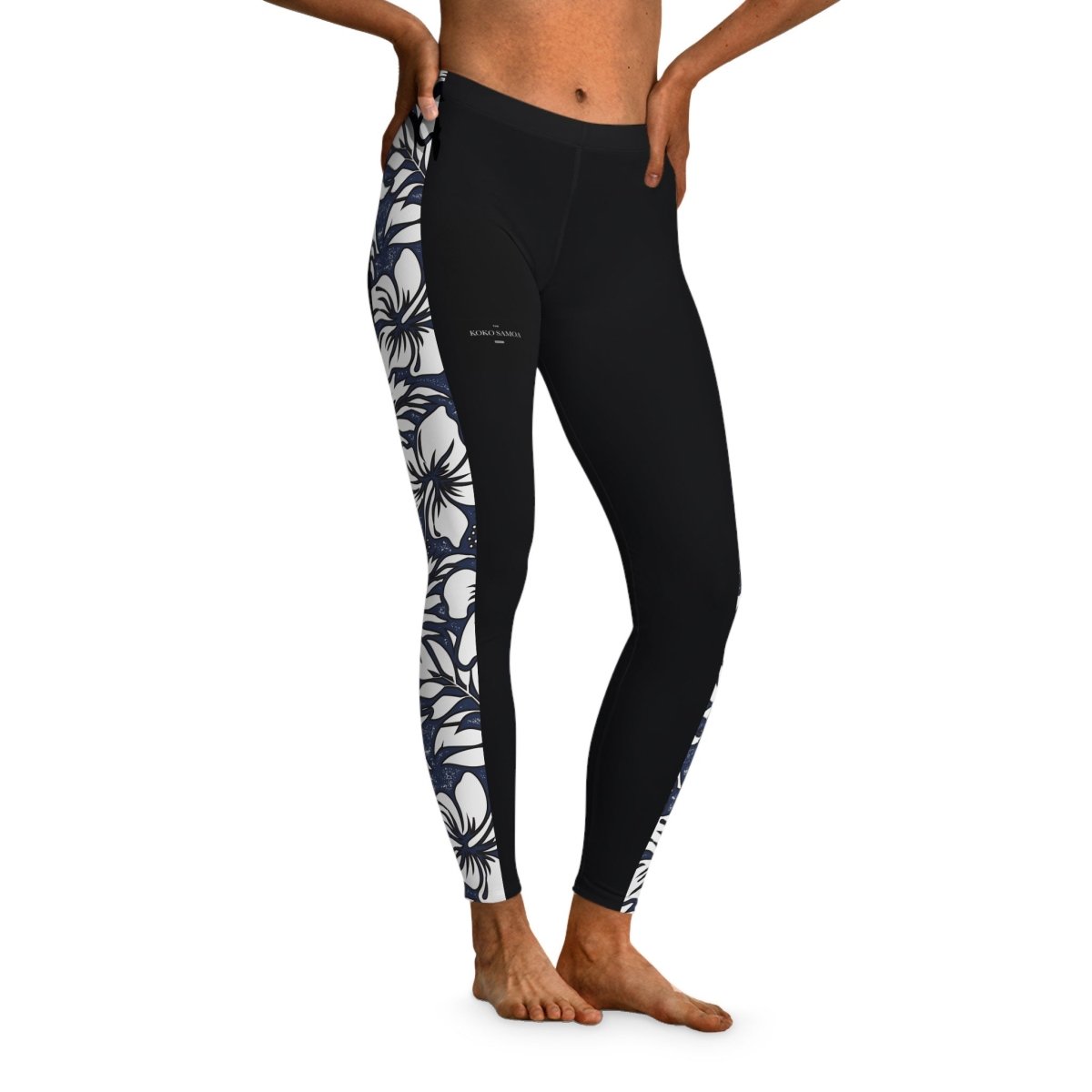 Black FYBY IslandFlex Mid-Rise Leggings in Falefa Breeze fabric, shown flat with elastic waistband and smooth stretchy material.