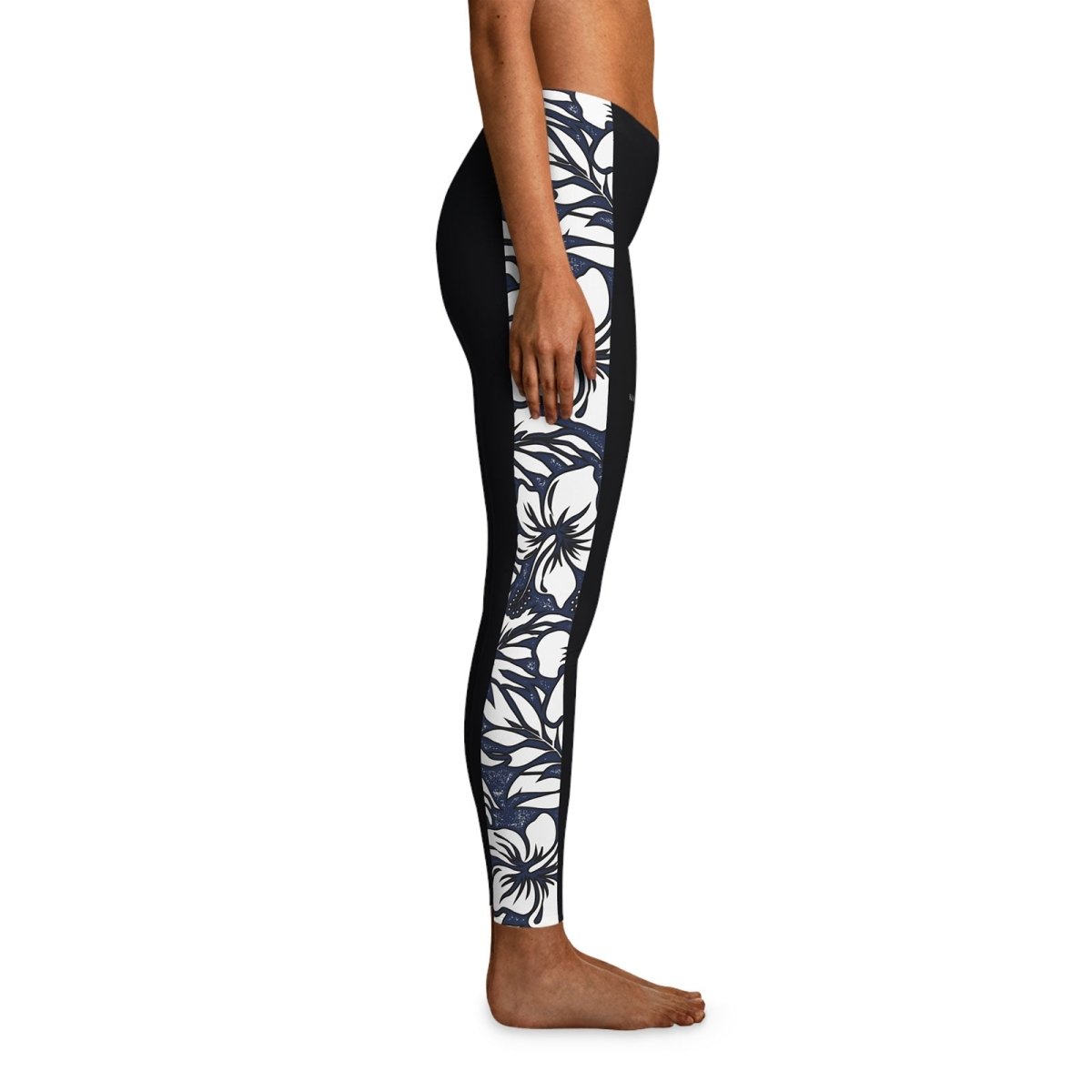Black FYBY IslandFlex Mid-Rise Leggings in Falefa Breeze style, shown on a model, featuring a comfortable fit and sleek design.