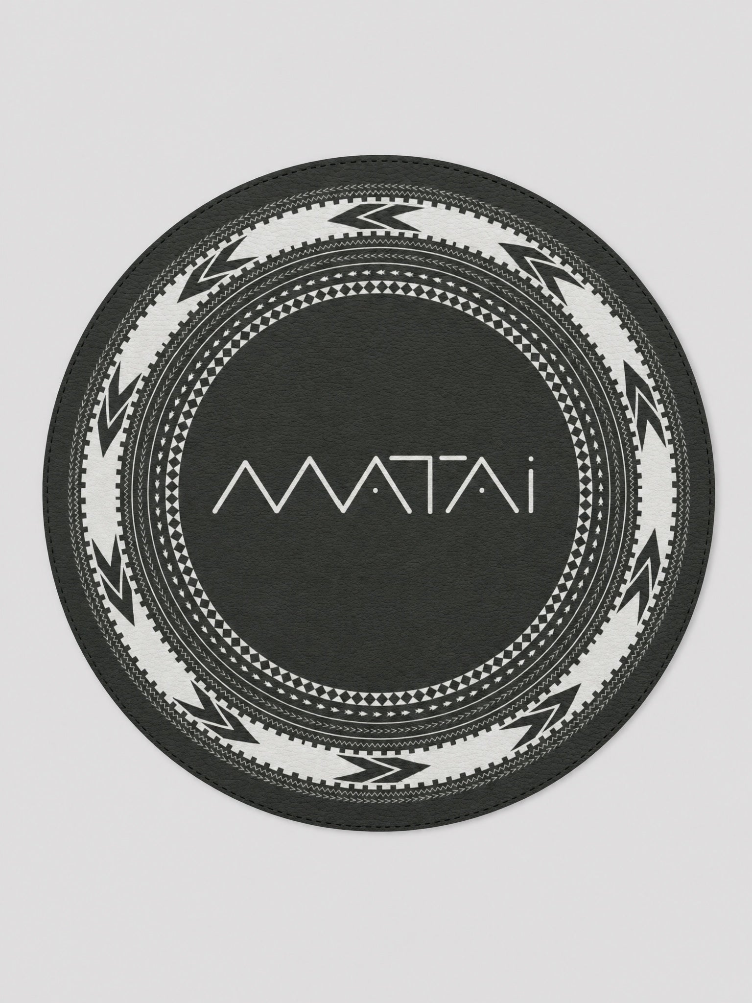 Leather Mouse Mat - Matai on a light grey studio background