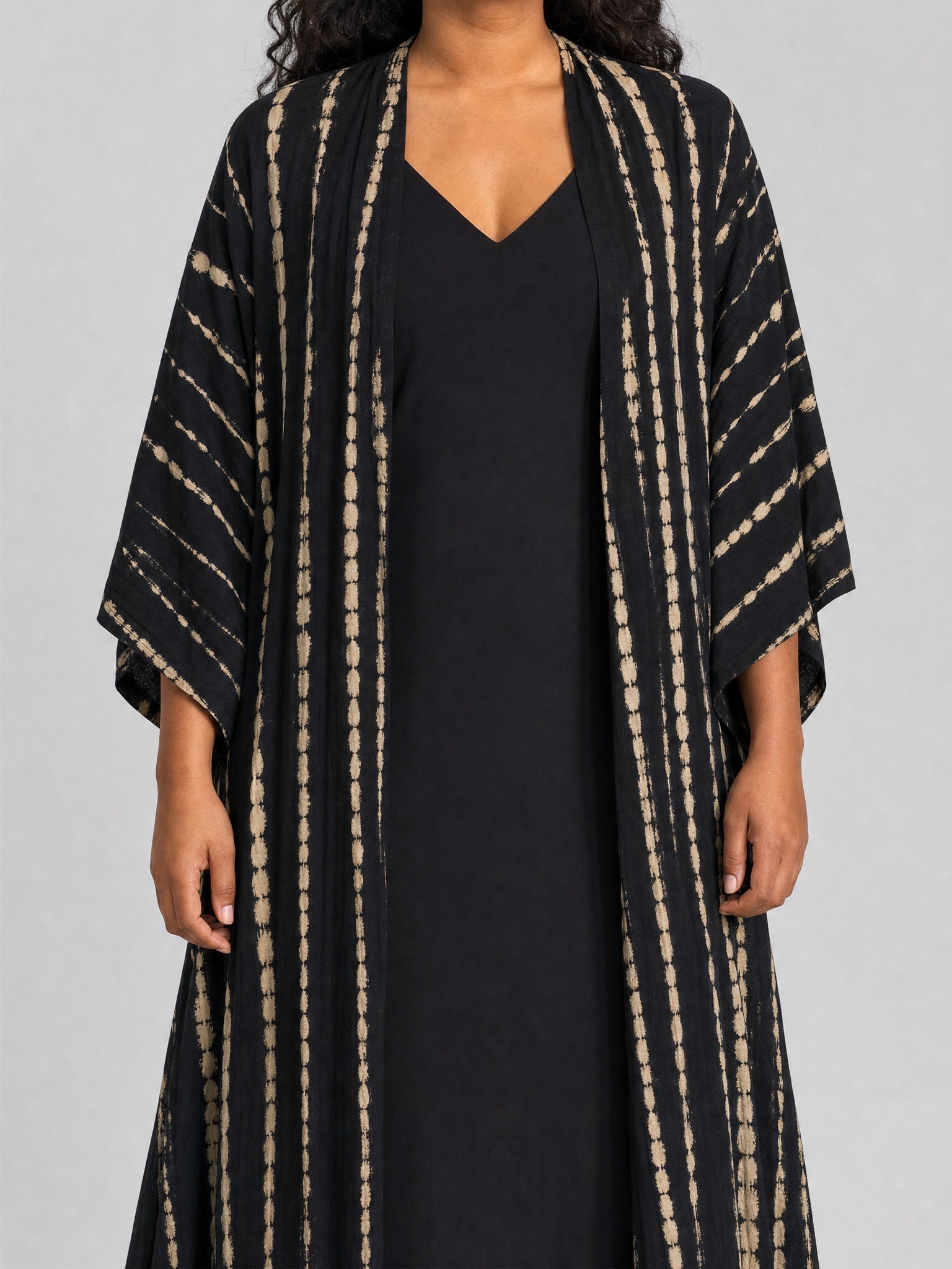 Kimono - Eclipse by Lasi on a light grey studio background