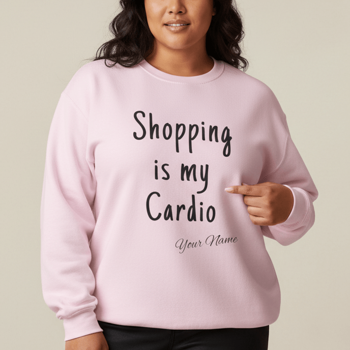 Unisex heavy sweatshirt by The Print Bar featuring personalized "Shopping is My Cardio" design on ash-colored fabric.