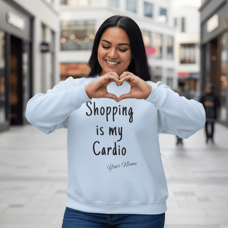 Unisex heavy sweatshirt with "Shopping is My Cardio" personalized design in ash color, from The Print Bar.