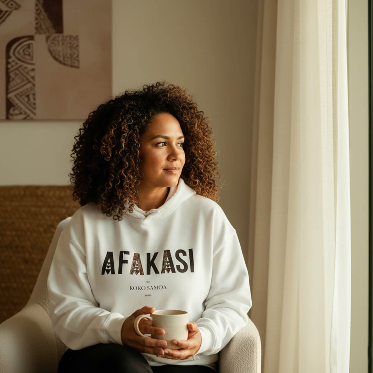 Black IslandSoft™ hoodie, premium hoodie in XS-XL size, featuring Afakasi design, made in the USA.