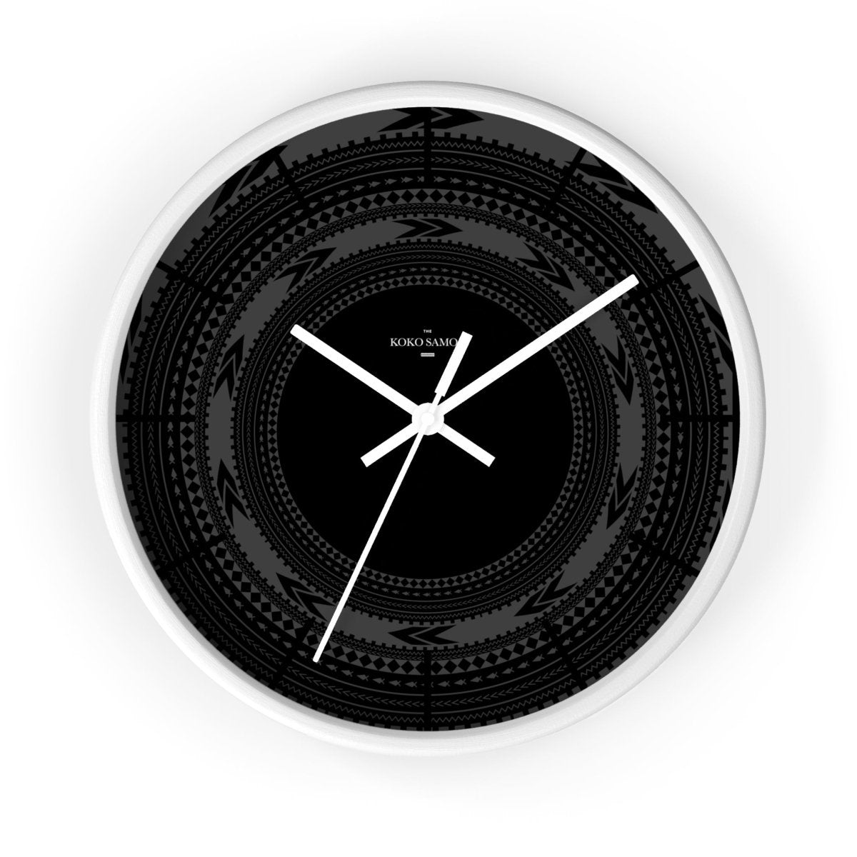 Black 10-inch wall clock with a sleek Pe'a design, ideal for home decor, featuring a black base and modern style.