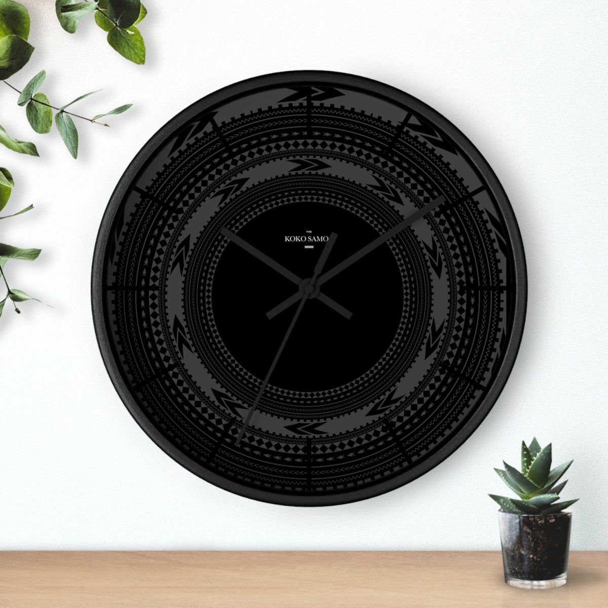 Black 10-inch wall clock with a matte black finish and modern design, suitable for home decor in AU, NZ, and USA.