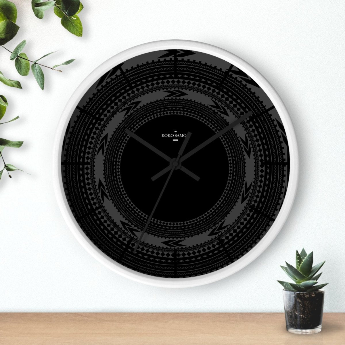 Black 10-inch wall clock with Pe'a, perfect for home decor in AU, NZ, and USA.