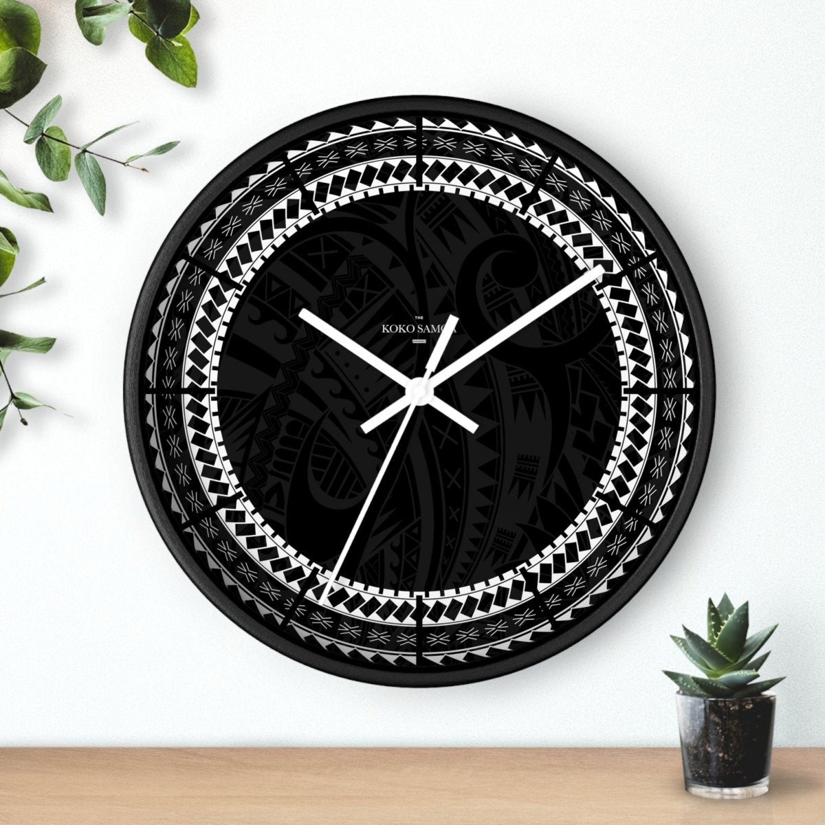 Black 10-inch Warrior wall clock, featuring bold design, ideal for home decor in AU, NZ, and USA settings.