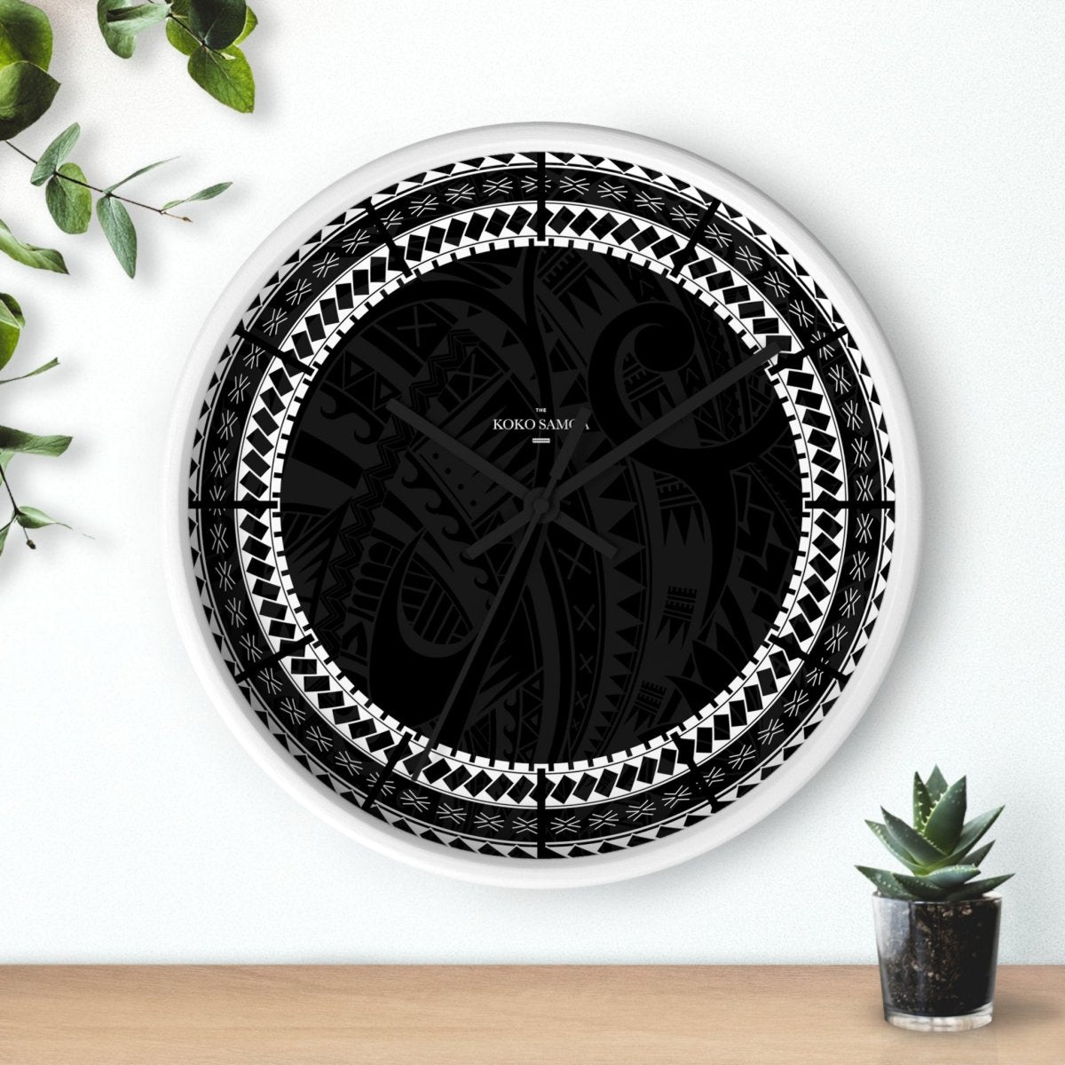 Black 10-inch Warrior wall clock, featuring a modern design, perfect for home decor in AU, NZ, and USA settings.