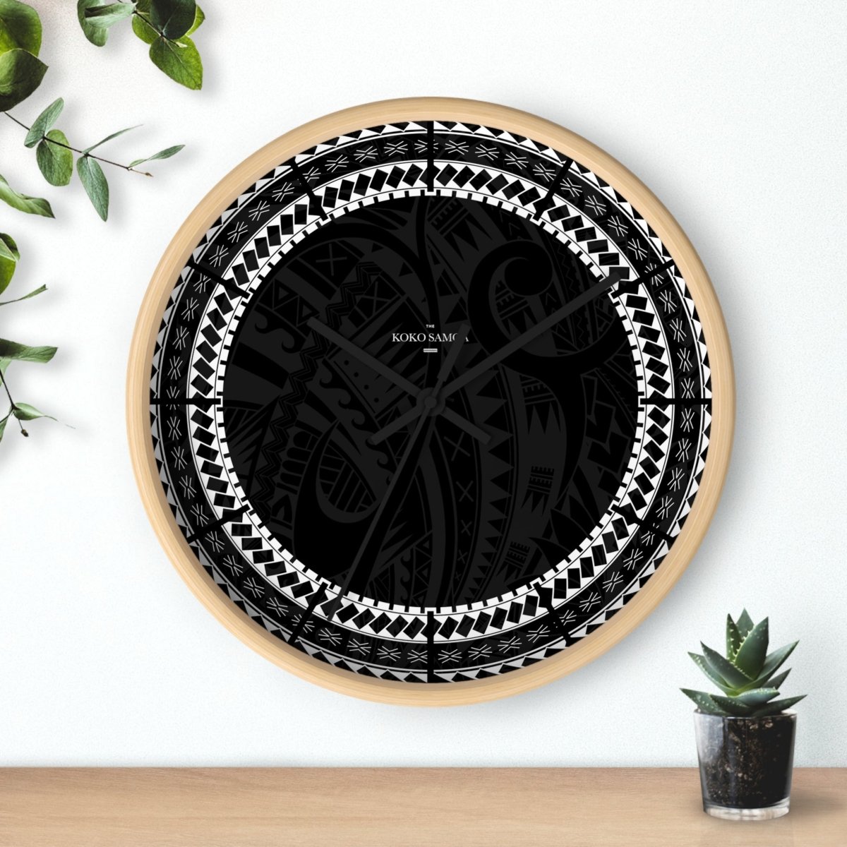 Black 10-inch Warrior wall clock, featuring a bold design, suitable for home decor in AU, NZ, and USA.