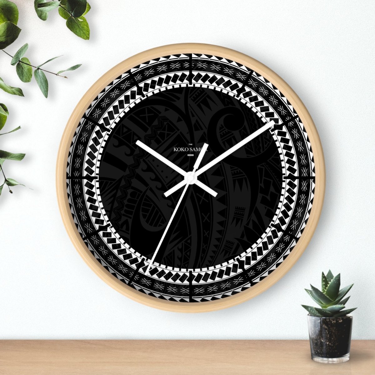 Black 10-inch Warrior wall clock, featuring a modern home decor design with a black base and bold warrior graphic.