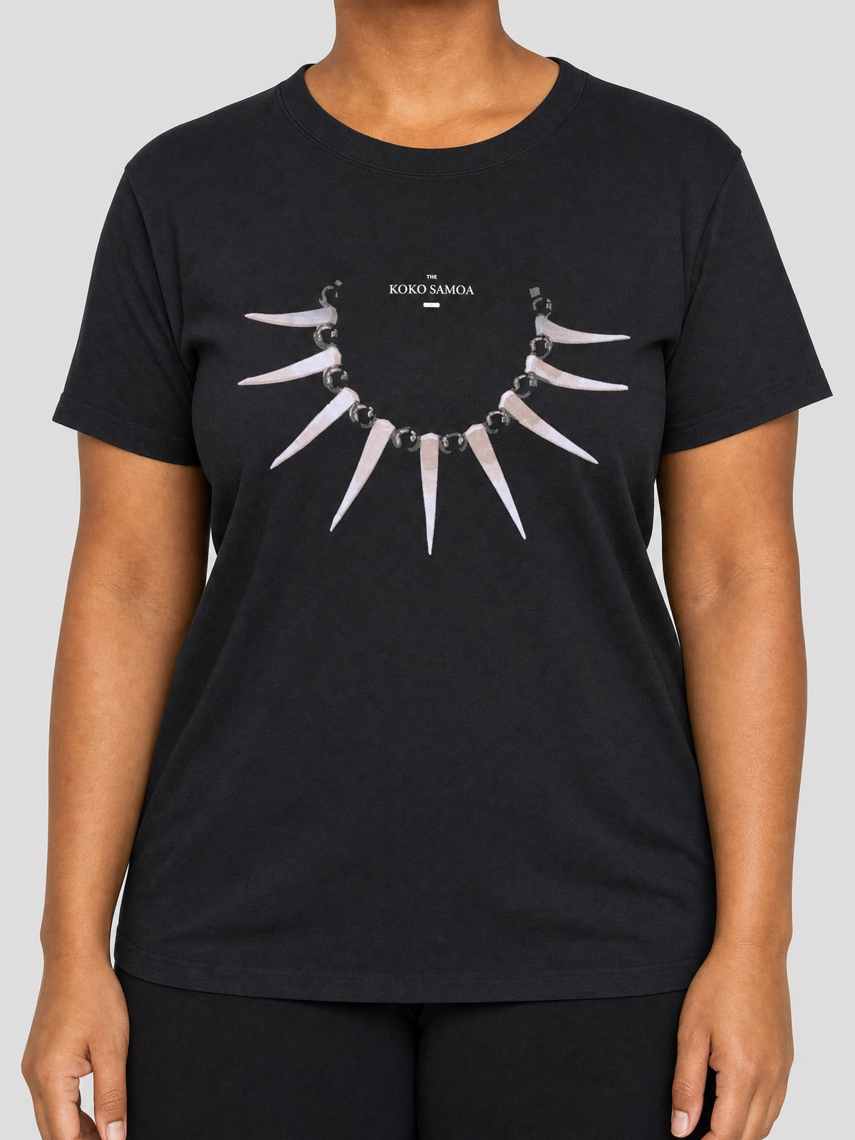 Unisex Tee - Ula Nifo on a light grey studio background