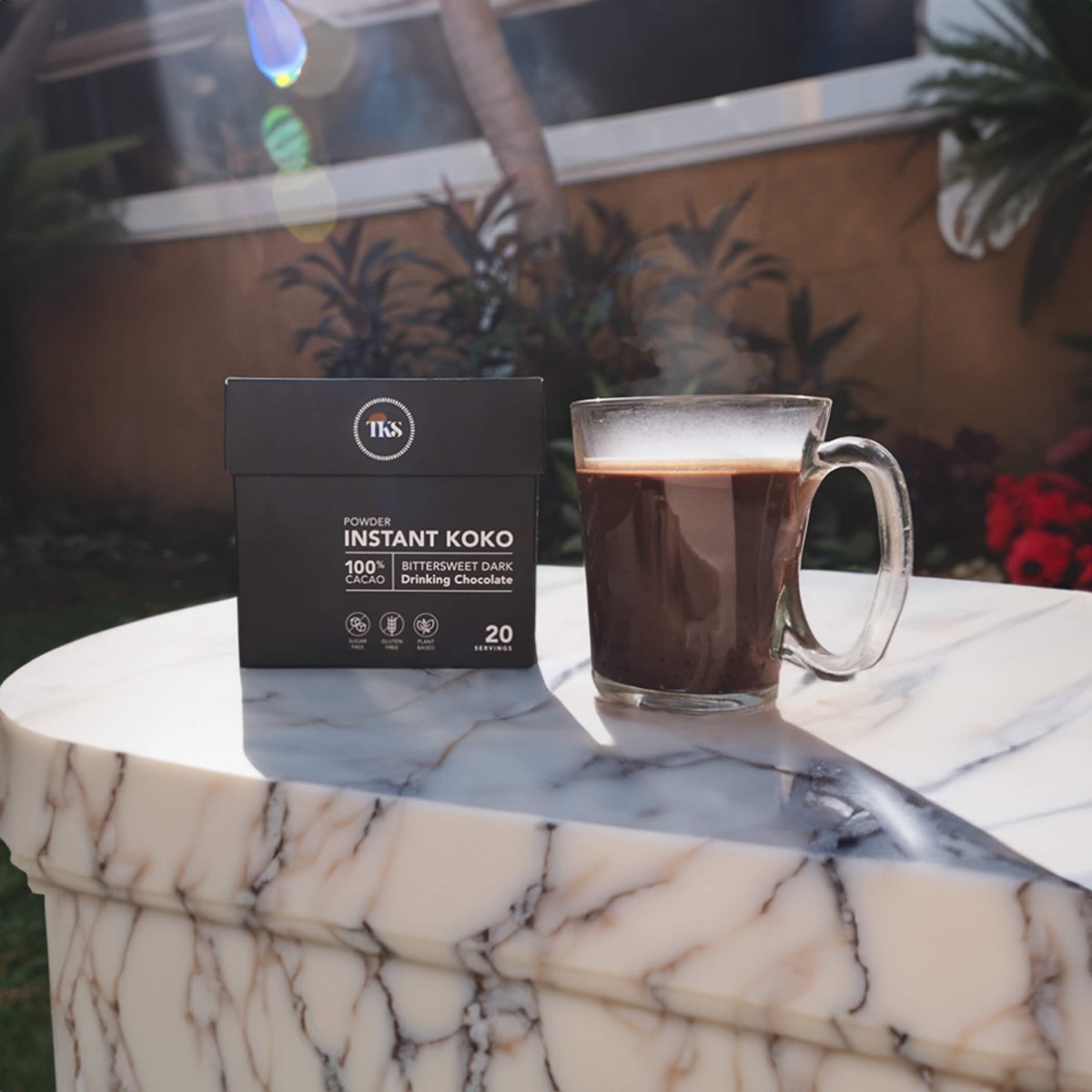 Instant Koko Samoa drinking chocolate by THE KOKO SAMOA, showcasing a rich, smooth cocoa powder in a jar.