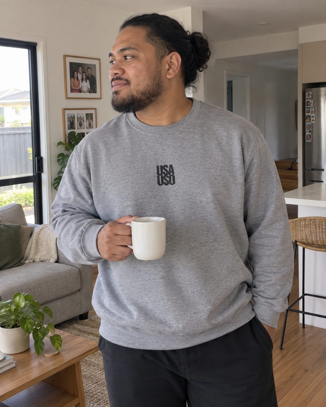 Unisex Heavy Sweatshirt in the Black Embroidered print, worn out on an ordinary day.