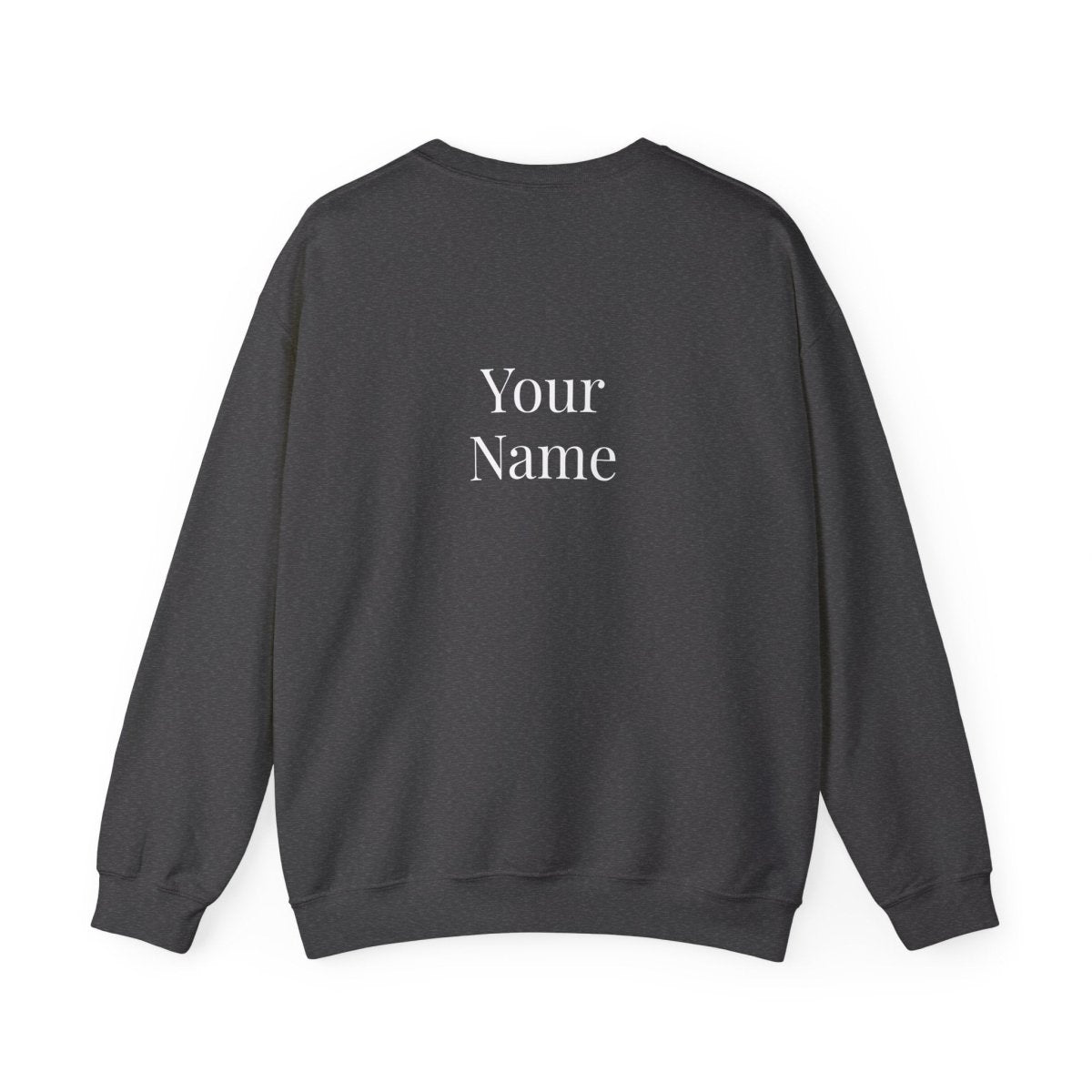 Unisex heavy sweatshirt by The Print Bar featuring "Exclaim" design, worn by a person, in a casual indoor setting.