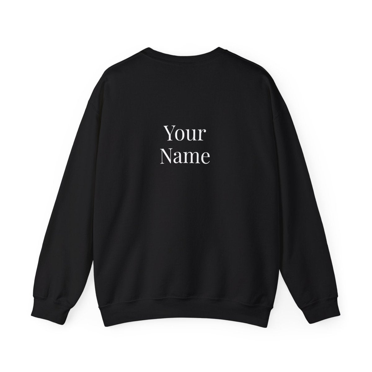Unisex heavy sweatshirt by The Print Bar featuring the "Exclaim" design, worn by a person, in a casual indoor setting.