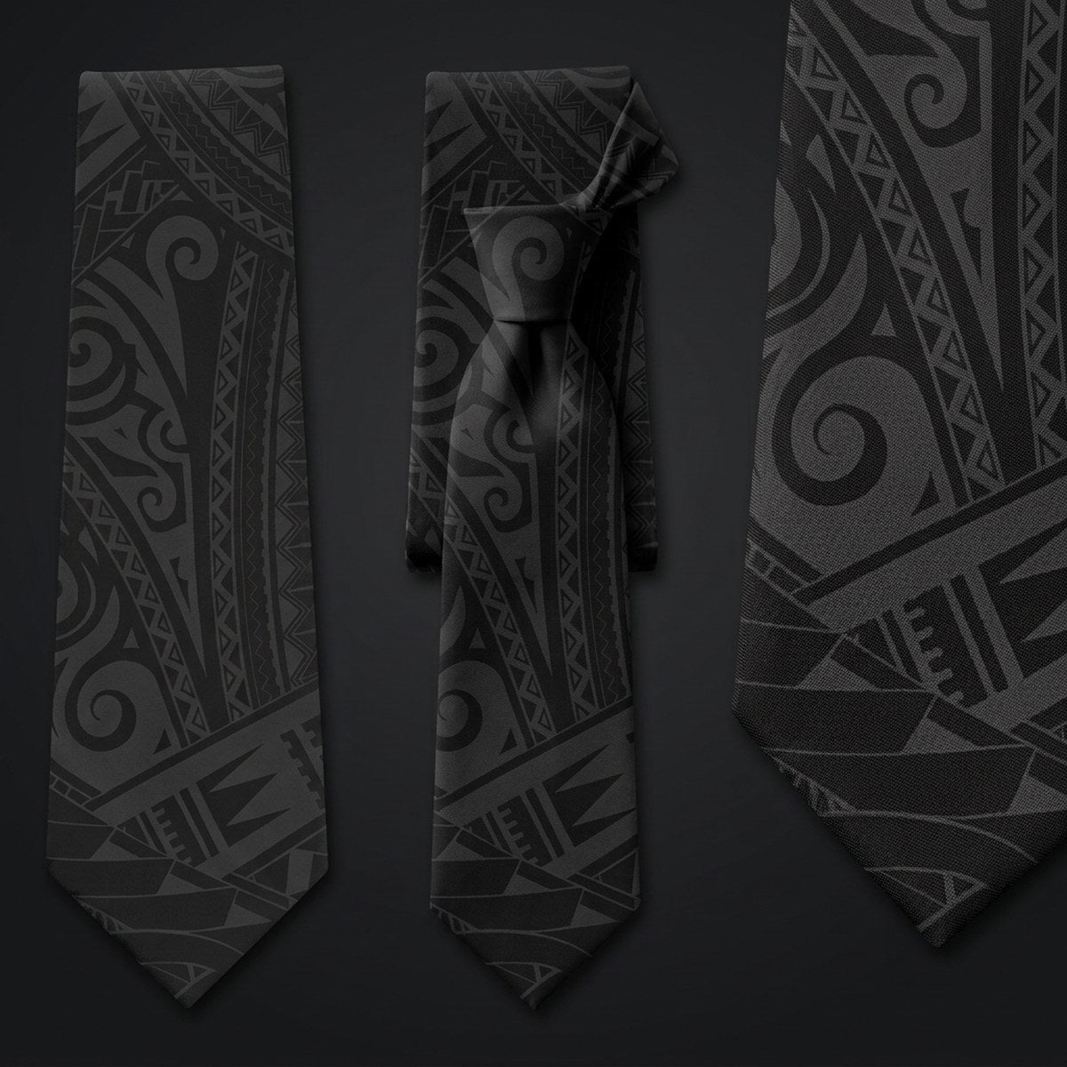Warrior black necktie shown flat and knotted, tonal Samoan tatau print